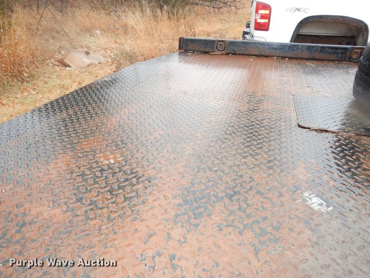 image for item DI6971 2009 GMC Sierra 2500HD  Ext. Cab flatbed pickup truck