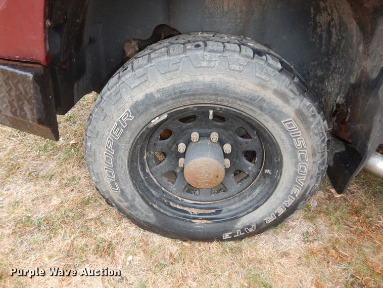 image for item DI6971 2009 GMC Sierra 2500HD  Ext. Cab flatbed pickup truck