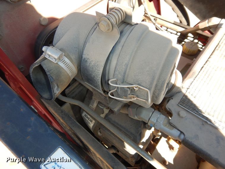 image for item DK7582 2014 Toro TX427  compact utility loader