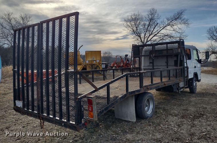 image for item DR8158 2014 Mitsubishi Fuso FE160  Crew Cab flatbed truck