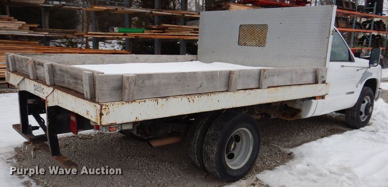image for item IO9332 2000 Chevrolet C3500  flatbed pickup truck