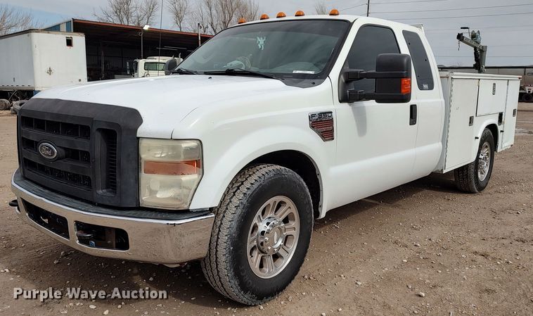 image for item LF9532 2010 Ford F350 Super Duty  SuperCab utility bed pickup truck