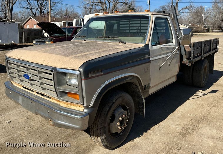 image for item LT9384 1986 Ford F350  flatbed pickup truck