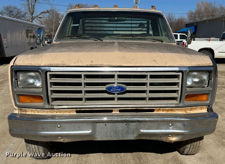image for item LT9384 1986 Ford F350  flatbed pickup truck