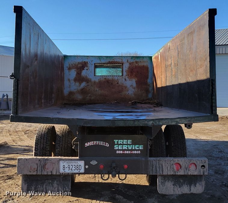 image for item DM8210 1999 GMC C6500  dump truck