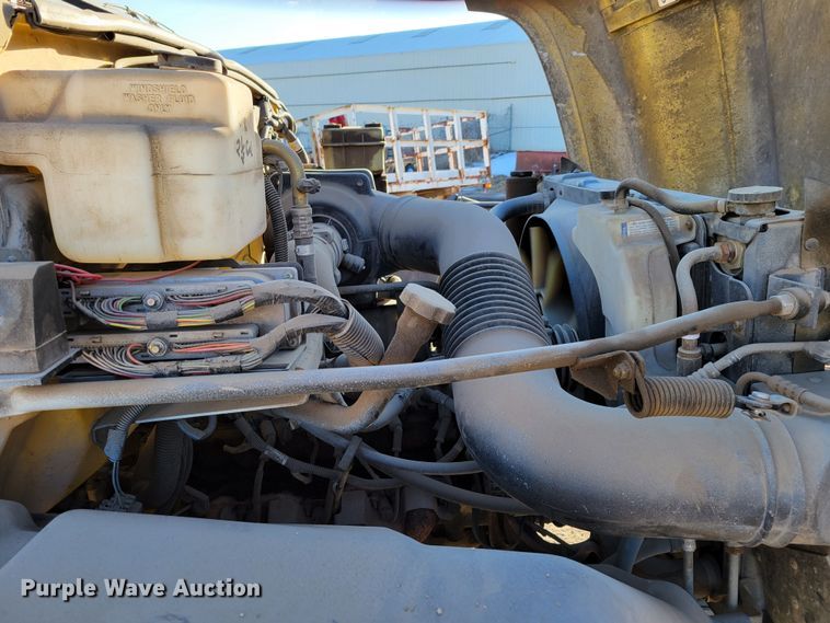 image for item DM8210 1999 GMC C6500  dump truck