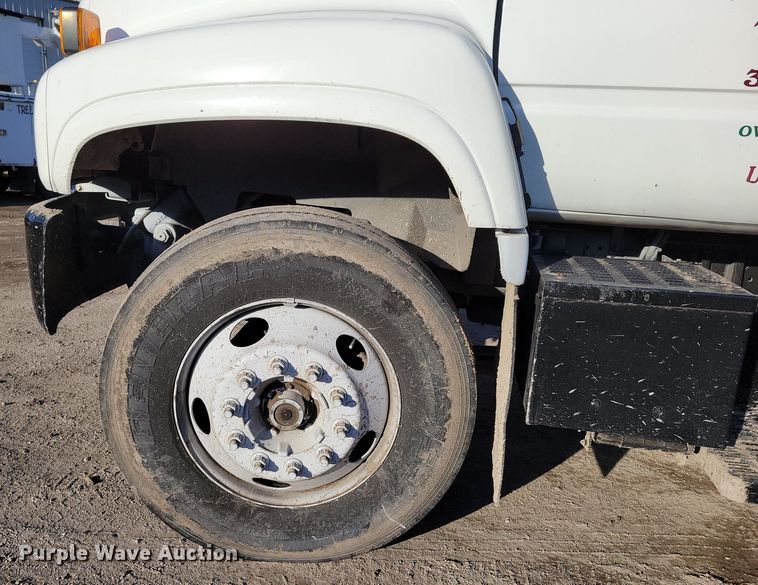 image for item DM8210 1999 GMC C6500  dump truck