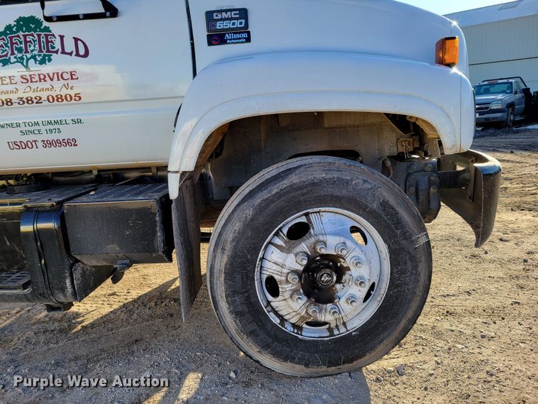 image for item DM8210 1999 GMC C6500  dump truck