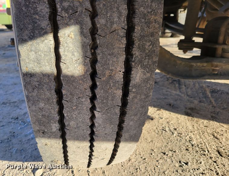 image for item DM8210 1999 GMC C6500  dump truck