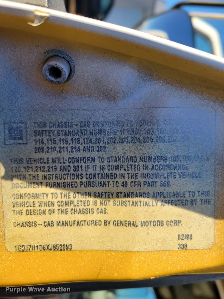 image for item DM8210 1999 GMC C6500  dump truck