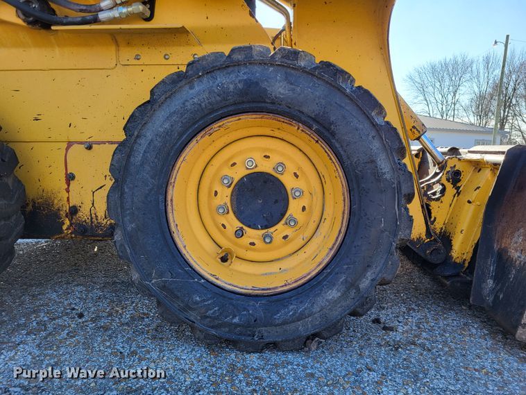 image for item DO3539 2000 John Deere 240  skid steer loader