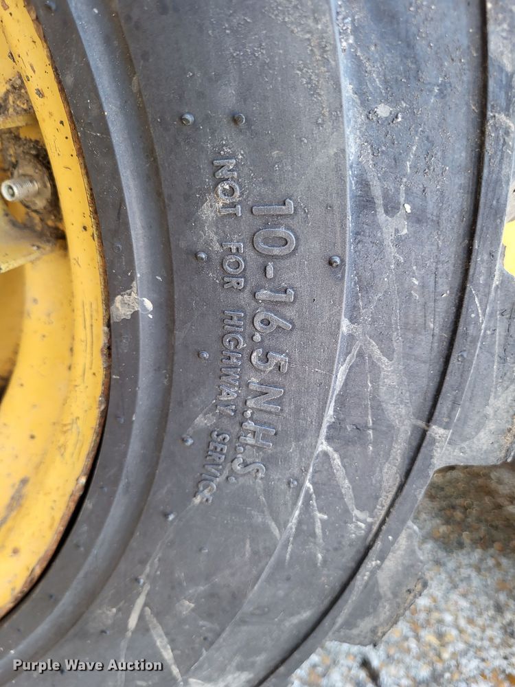 image for item DO3539 2000 John Deere 240  skid steer loader