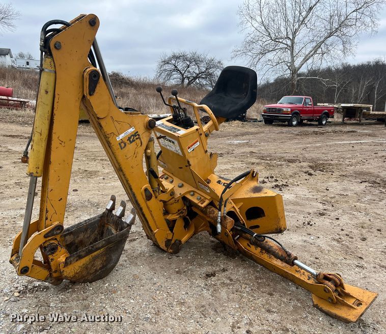 image for item JU9670 Case H939218 D125  skid steer backhoe