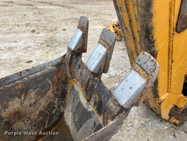 image for item JU9670 Case H939218 D125  skid steer backhoe