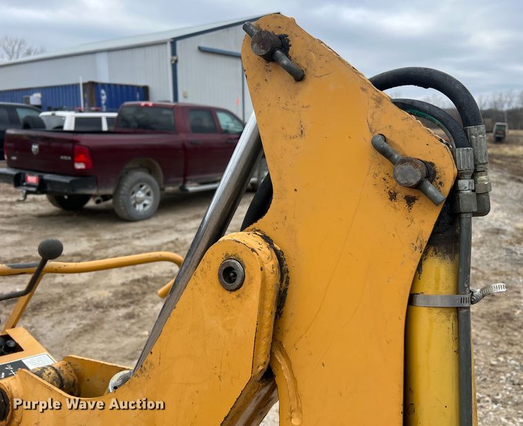 image for item JU9670 Case H939218 D125  skid steer backhoe