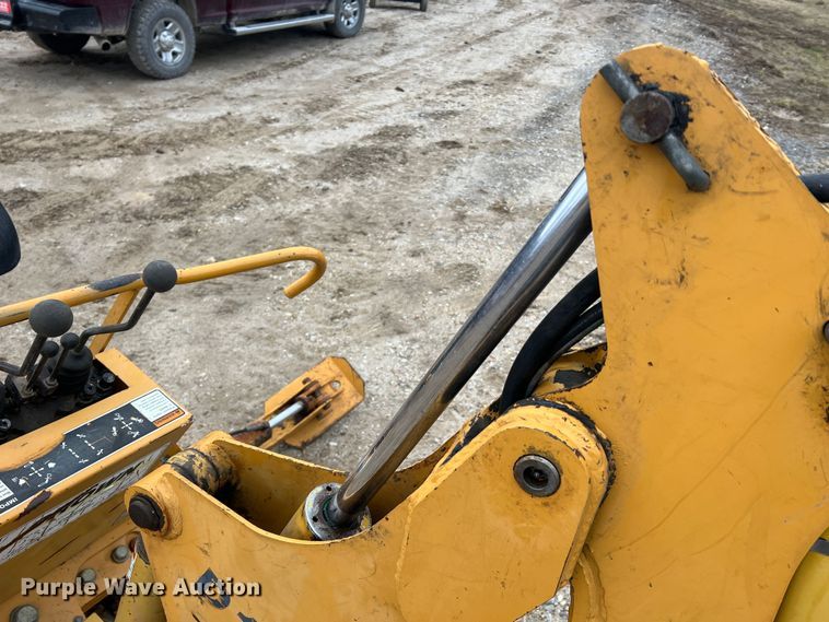 image for item JU9670 Case H939218 D125  skid steer backhoe