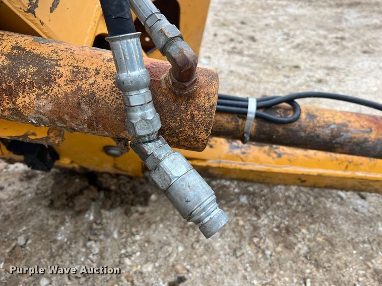 image for item JU9670 Case H939218 D125  skid steer backhoe