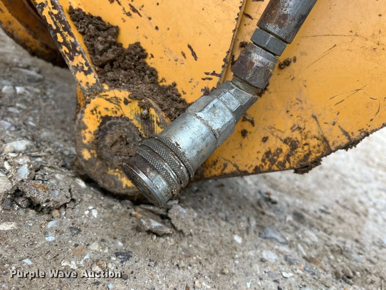 image for item JU9670 Case H939218 D125  skid steer backhoe