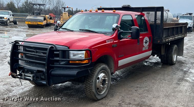 image for item ID9466 1999 Ford F550 Super Duty  Crew Cab dump flatbed truck