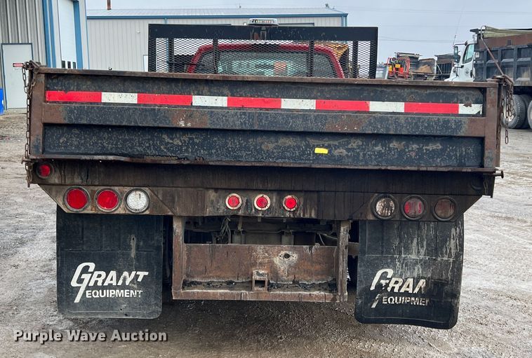 image for item ID9466 1999 Ford F550 Super Duty  Crew Cab dump flatbed truck