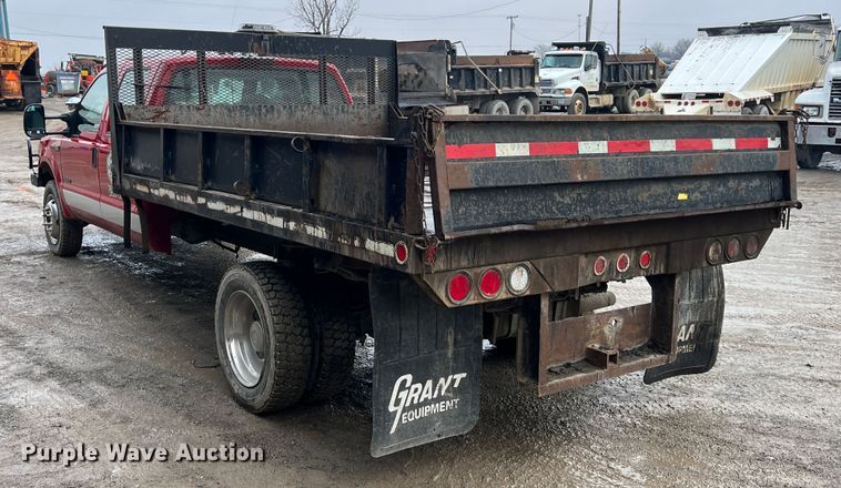 image for item ID9466 1999 Ford F550 Super Duty  Crew Cab dump flatbed truck