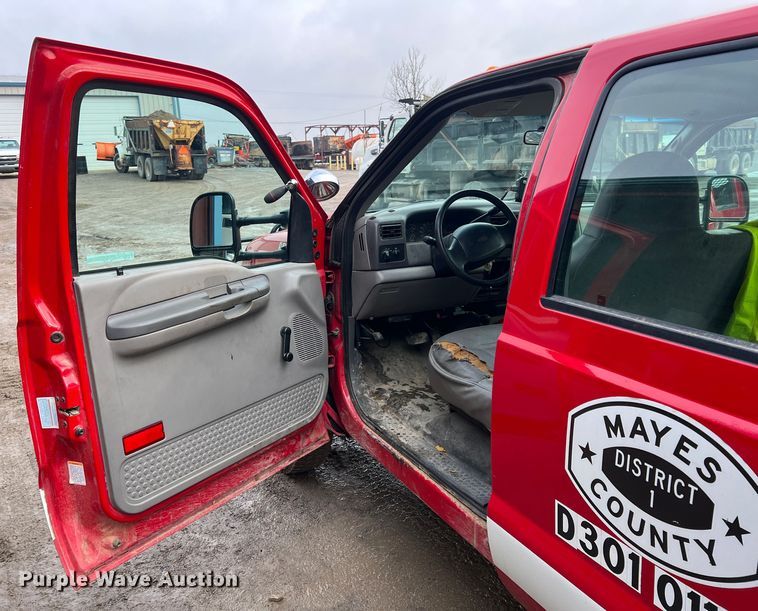 image for item ID9466 1999 Ford F550 Super Duty  Crew Cab dump flatbed truck