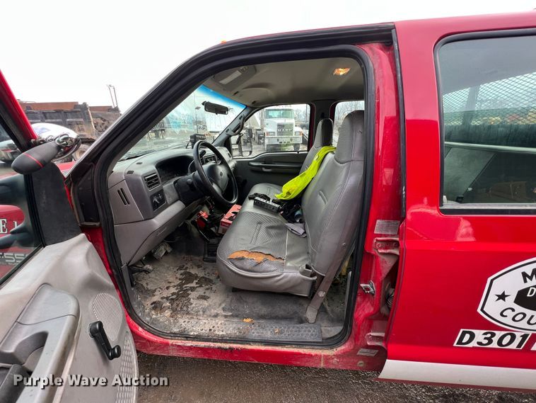 image for item ID9466 1999 Ford F550 Super Duty  Crew Cab dump flatbed truck