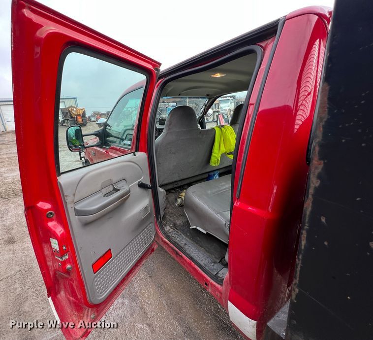 image for item ID9466 1999 Ford F550 Super Duty  Crew Cab dump flatbed truck