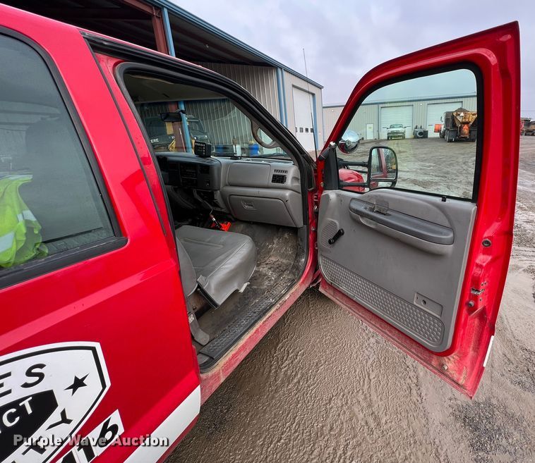 image for item ID9466 1999 Ford F550 Super Duty  Crew Cab dump flatbed truck