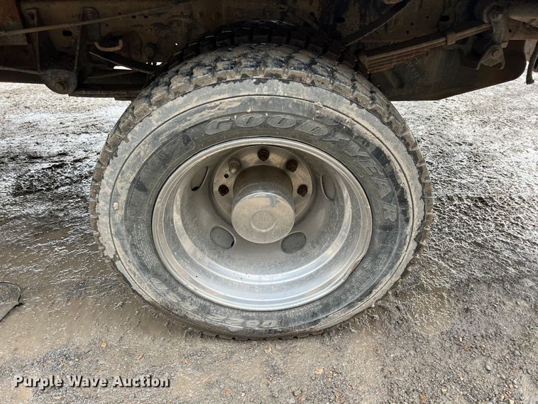 image for item ID9466 1999 Ford F550 Super Duty  Crew Cab dump flatbed truck