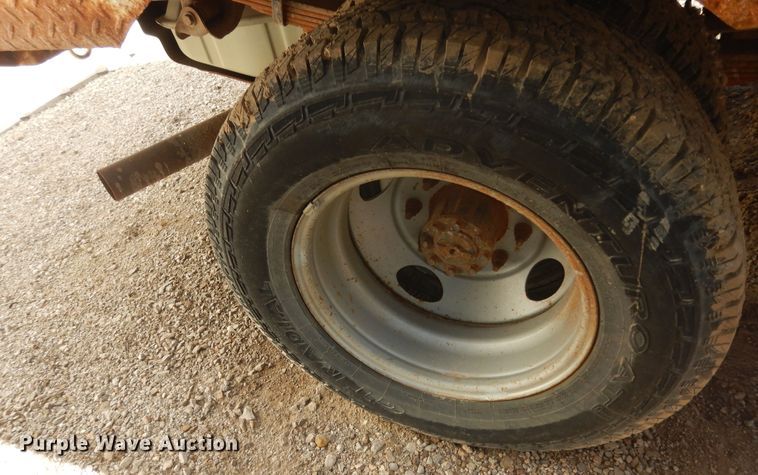 image for item JQ9766 2005 Ford F350 Super Duty XL  SuperCab flatbed pickup truck