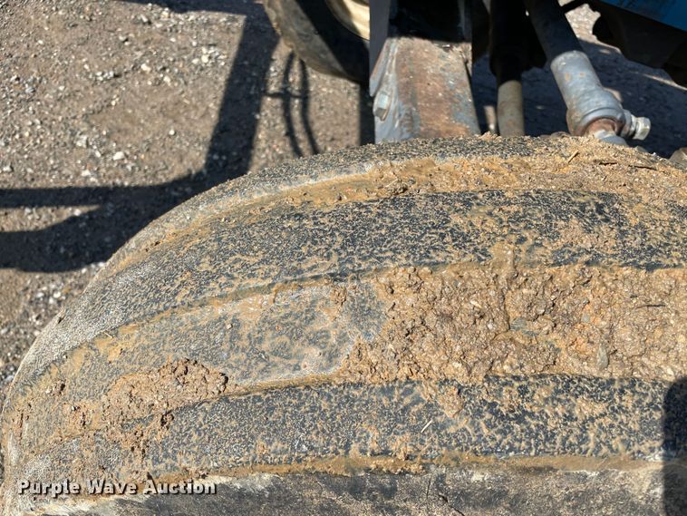 image for item MI9783 2000 New Holland TS100  tractor