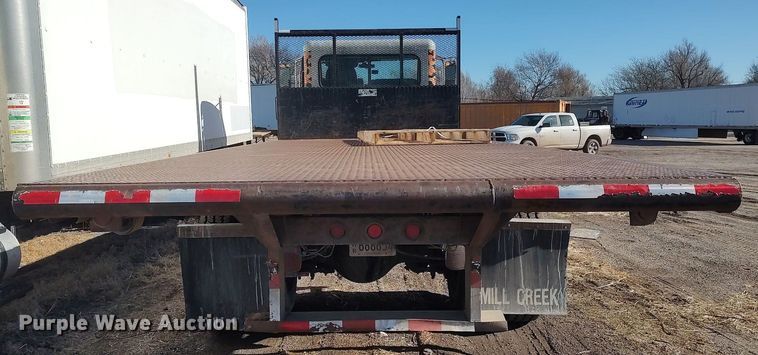 image for item DO3726 2009 Peterbilt 335  dump flatbed truck