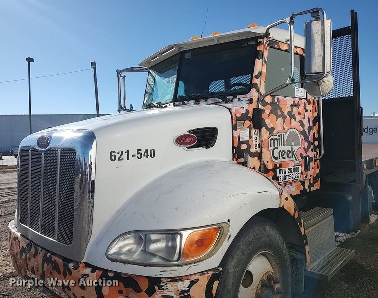 image for item DO3726 2009 Peterbilt 335  dump flatbed truck