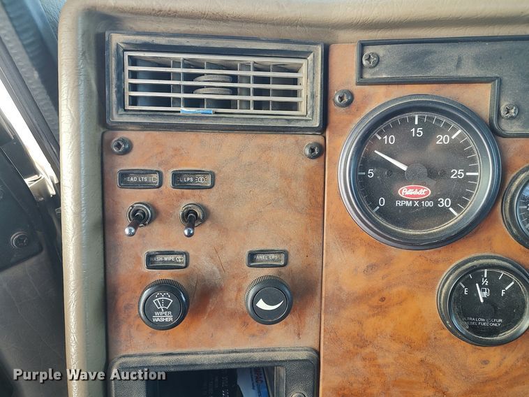 image for item DO3726 2009 Peterbilt 335  dump flatbed truck