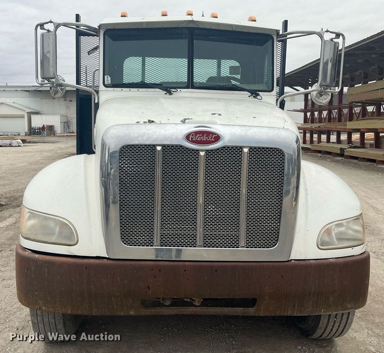 image for item DQ4092 2009 Peterbilt 335  dump flatbed truck