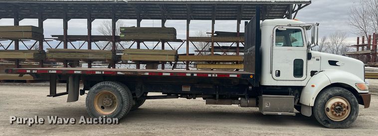 image for item DQ4092 2009 Peterbilt 335  dump flatbed truck