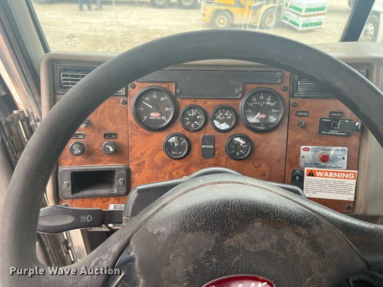 image for item DQ4092 2009 Peterbilt 335  dump flatbed truck