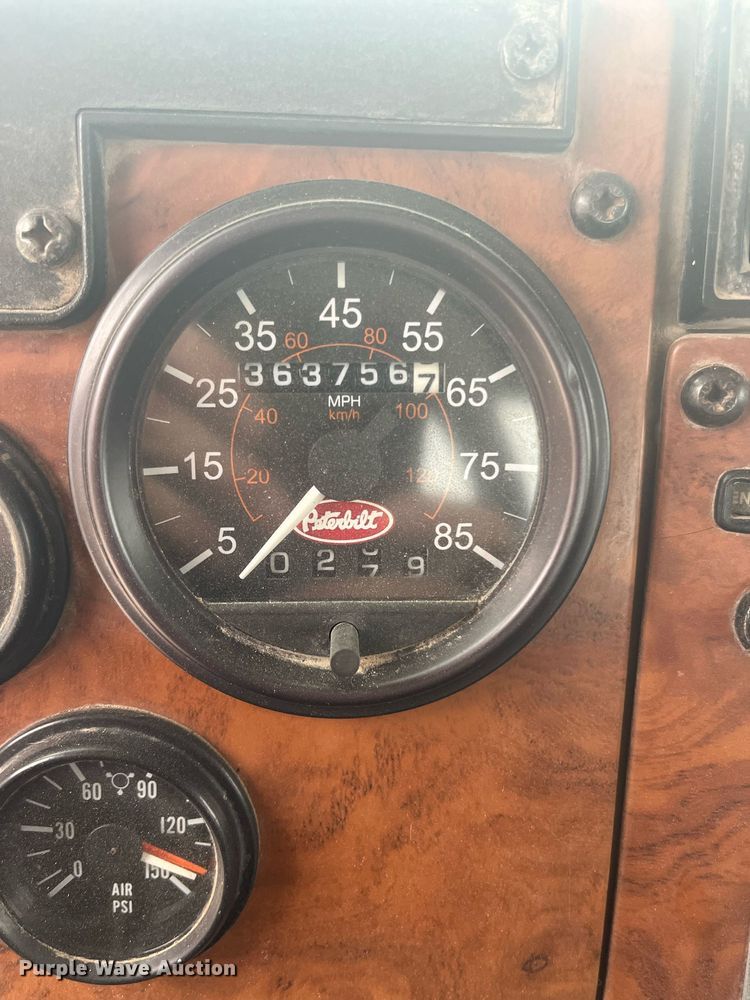 image for item DQ4092 2009 Peterbilt 335  dump flatbed truck