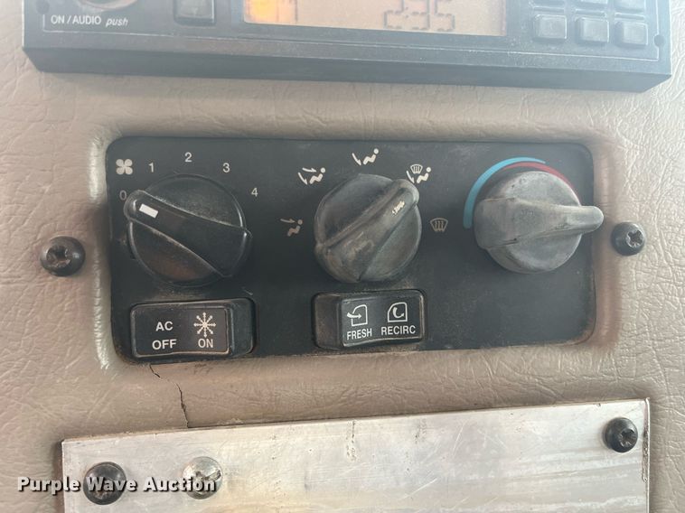 image for item DQ4092 2009 Peterbilt 335  dump flatbed truck