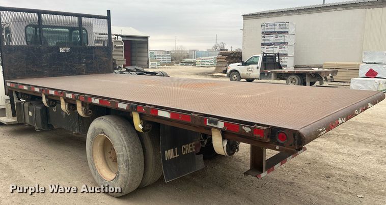 image for item DQ4092 2009 Peterbilt 335  dump flatbed truck