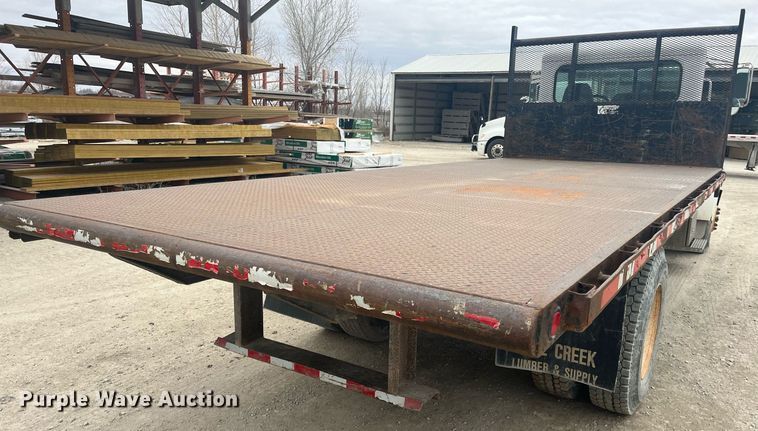 image for item DQ4092 2009 Peterbilt 335  dump flatbed truck