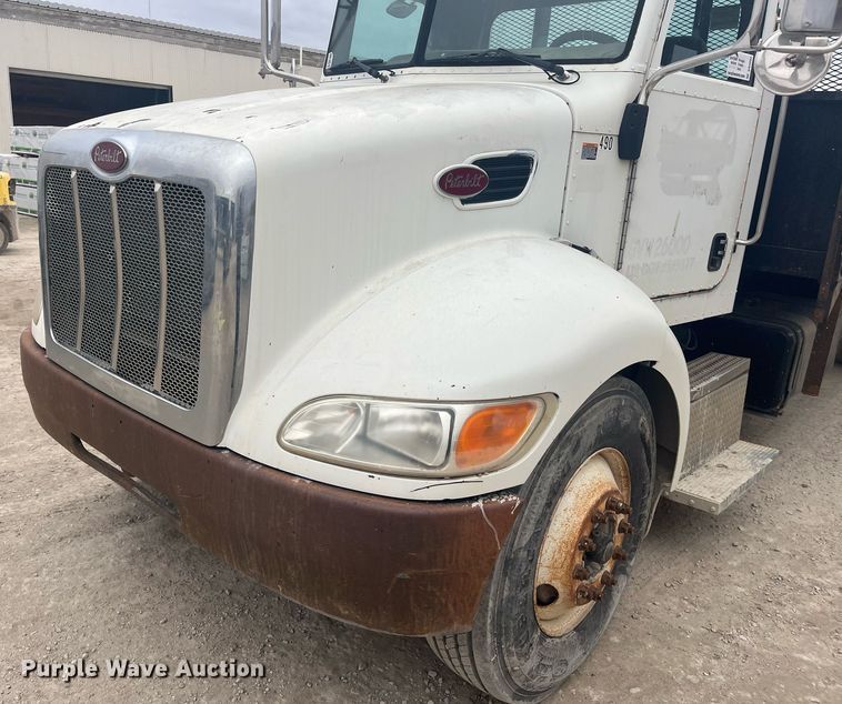 image for item DQ4092 2009 Peterbilt 335  dump flatbed truck