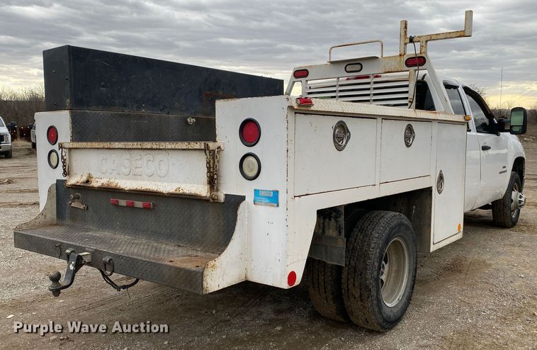 image for item DN8174 2009 GMC Sierra 3500HD  Ext. Cab utility bed pickup truck