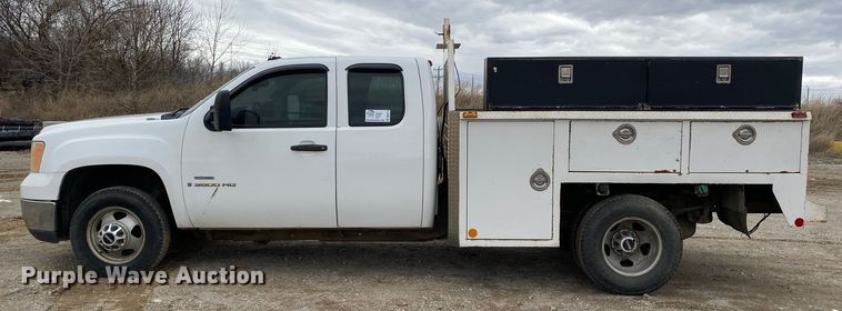 image for item DN8174 2009 GMC Sierra 3500HD  Ext. Cab utility bed pickup truck