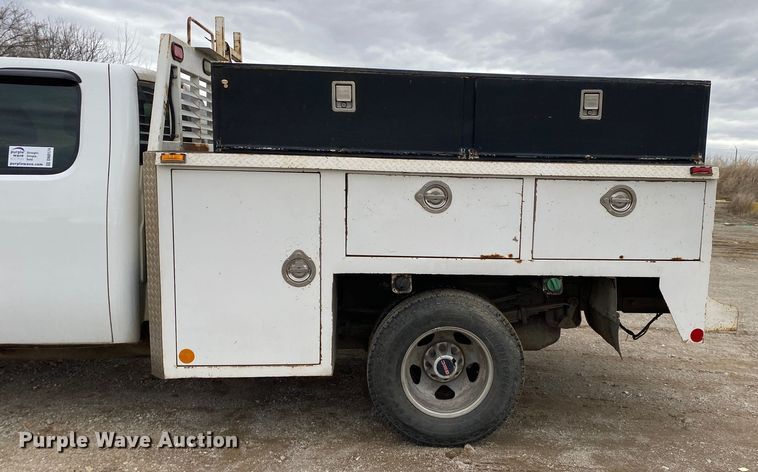 image for item DN8174 2009 GMC Sierra 3500HD  Ext. Cab utility bed pickup truck