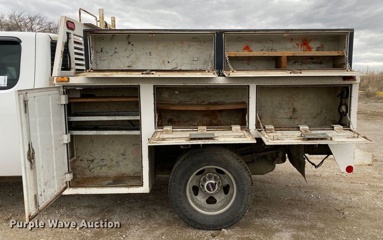 image for item DN8174 2009 GMC Sierra 3500HD  Ext. Cab utility bed pickup truck