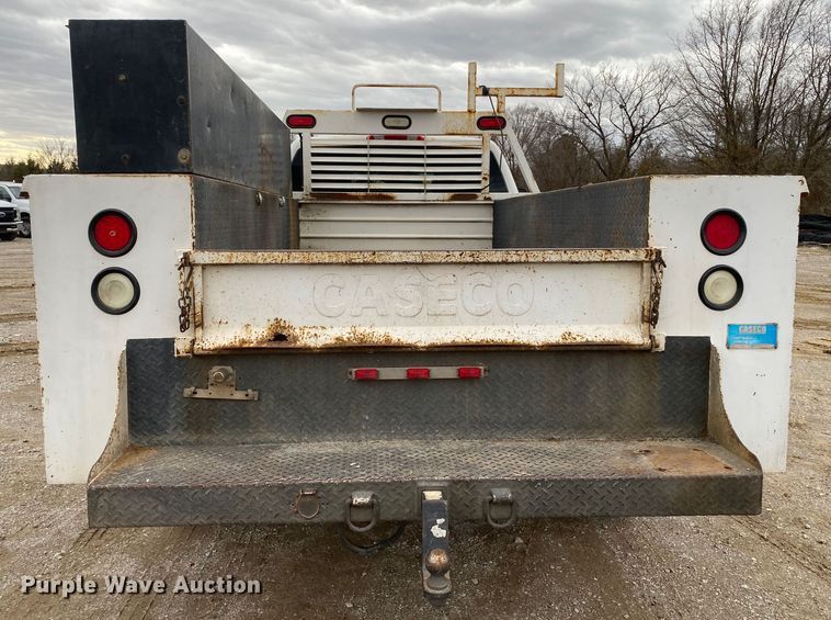 image for item DN8174 2009 GMC Sierra 3500HD  Ext. Cab utility bed pickup truck