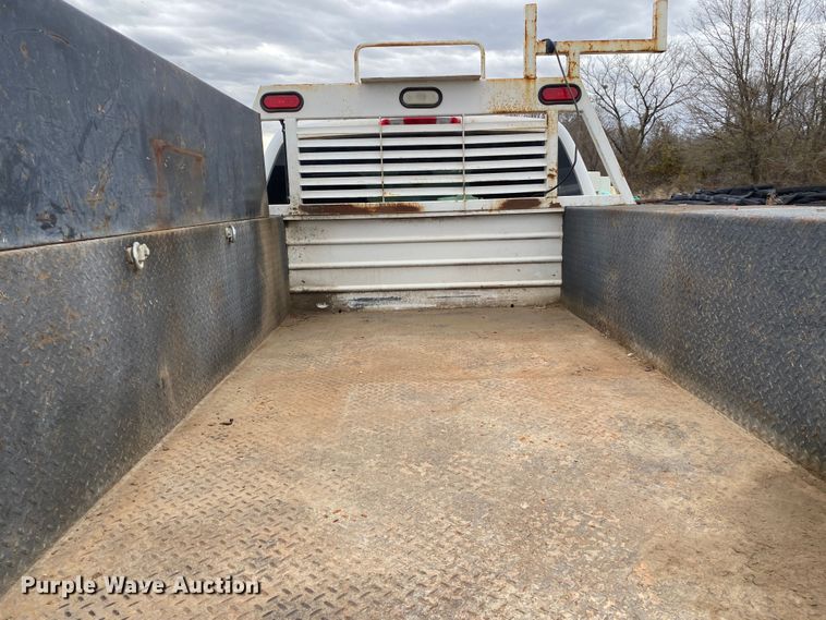 image for item DN8174 2009 GMC Sierra 3500HD  Ext. Cab utility bed pickup truck