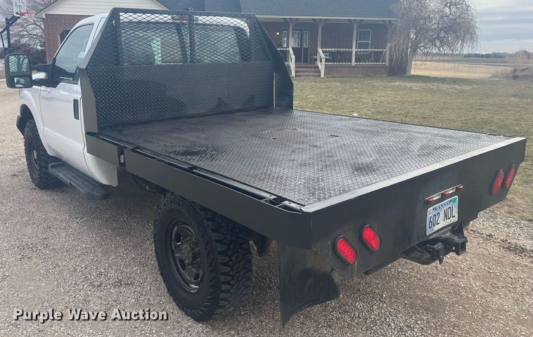 image for item HP9476 2011 Ford F250 Super Duty  flatbed pickup truck